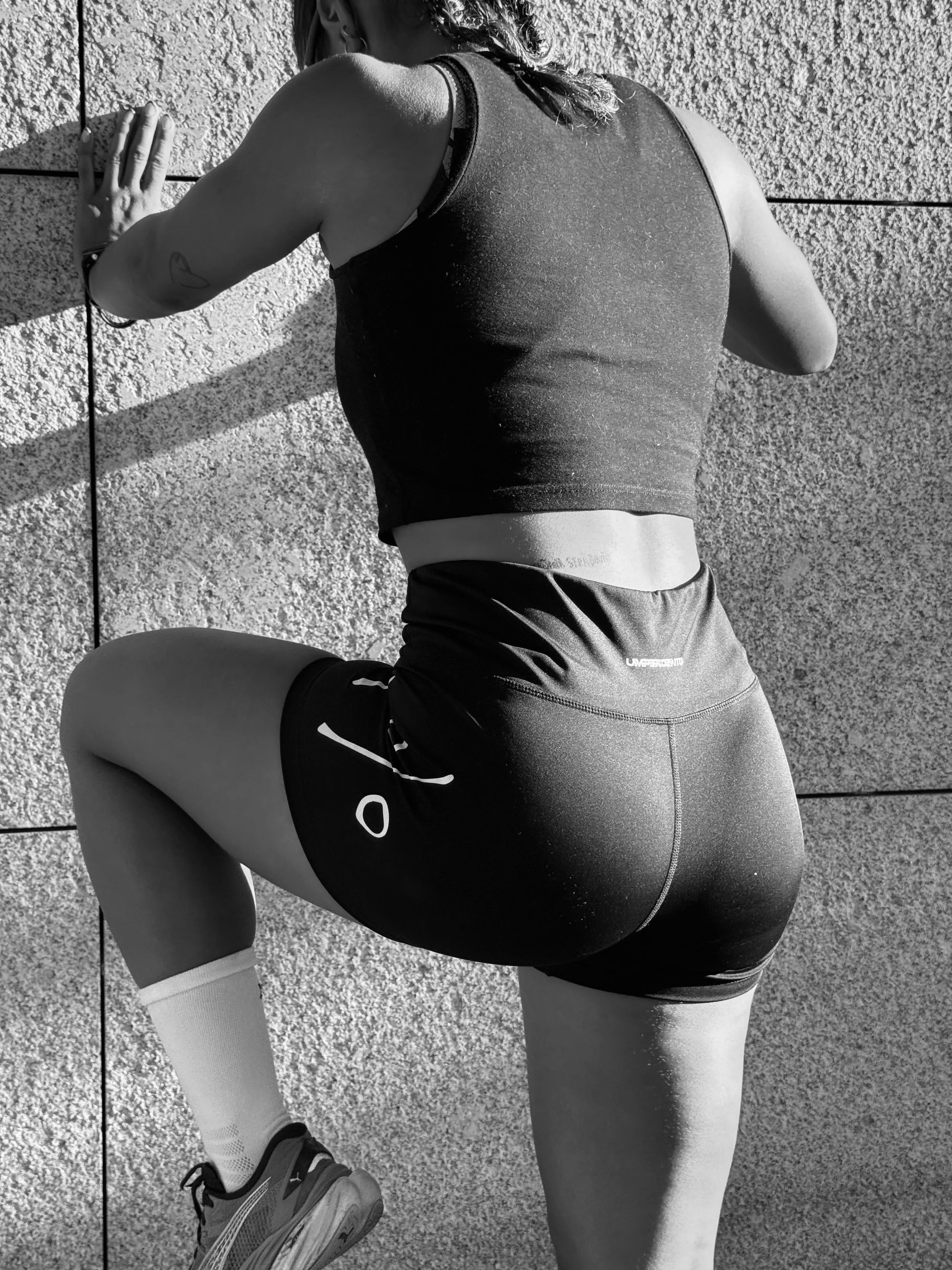 Close-up back view of Women’s Training Shorts — logo and rear pocket detail